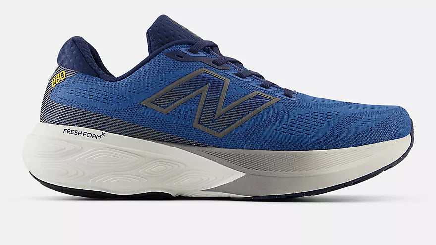 Blue New Balance 880 
V15 running shoe with white sole on a light gray background