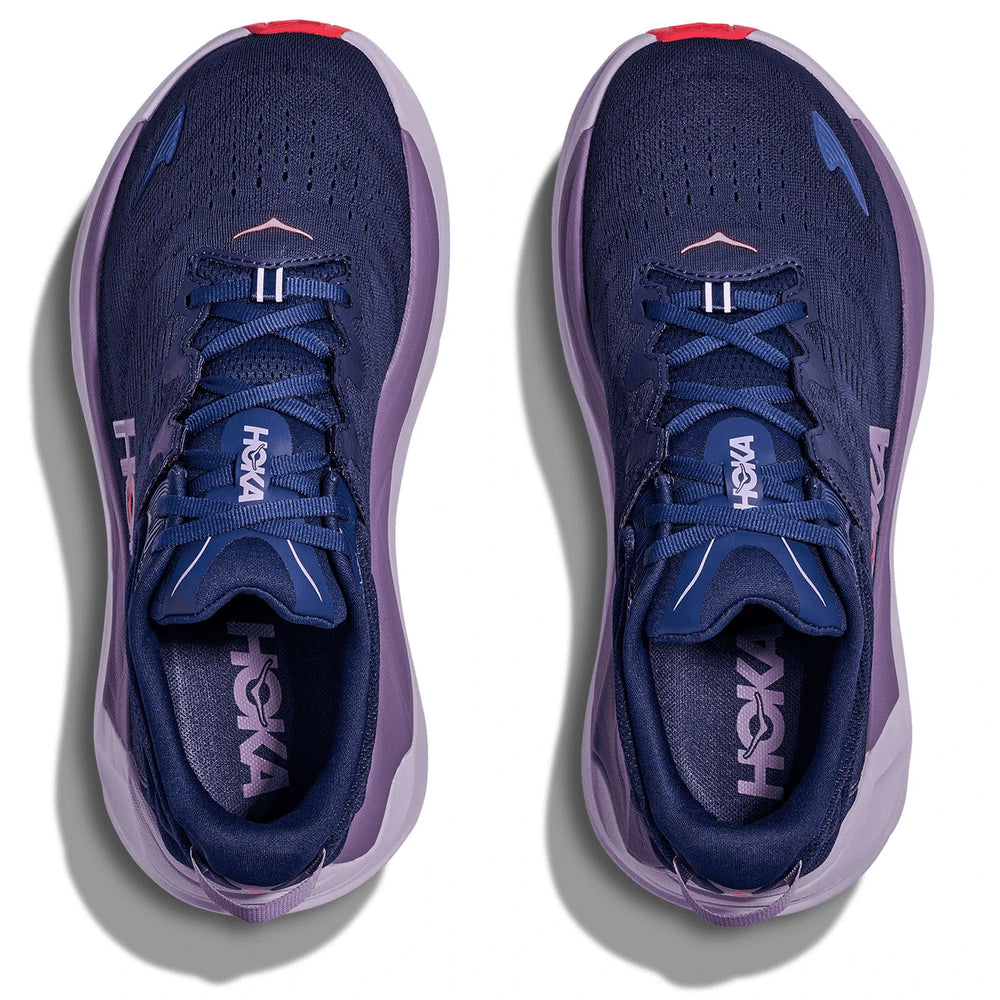 A pair of Hoka Gaviota 6 – Women's running shoes shown from a top-down view on a white background. The shoes feature a dark navy blue knit upper with a light purple/lavender midsole and heel accents, navy blue laces, and a small red accent on the toe bumper.