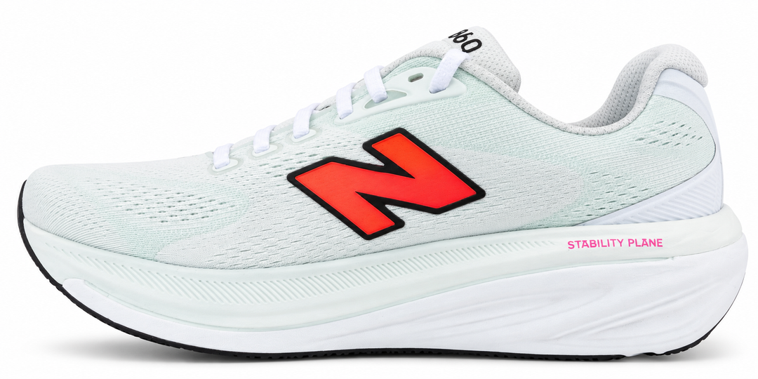 A New Balance Fresh Foam X 860 V15 running shoe in a very pale mint green with a prominent red &