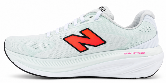 A New Balance Fresh Foam X 860 V15 running shoe in a very pale mint green with a prominent red &