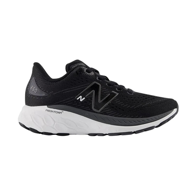 A black New Balance 860 V13 – Kids' running shoe with a white midsole, shown from a side profile view against a plain white background.