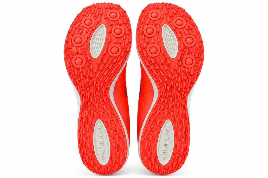 A pair of red New Balance Xc7 V4 – Men&