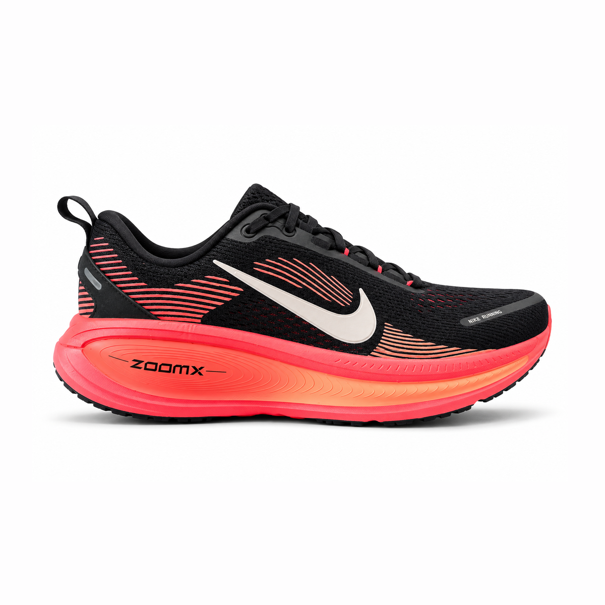 A Nike Vomero 18 – Women's running shoe in black with vibrant coral pink and orange accents, featuring a white Swoosh logo and a thick cushioned ZoomX midsole, shown against a plain white background.