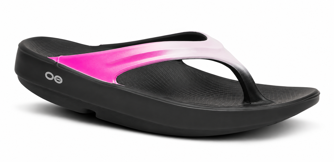 A single Oofos OOLALA sandal in black with a vibrant pink and white gradient strap, shown from a side profile on a white background.