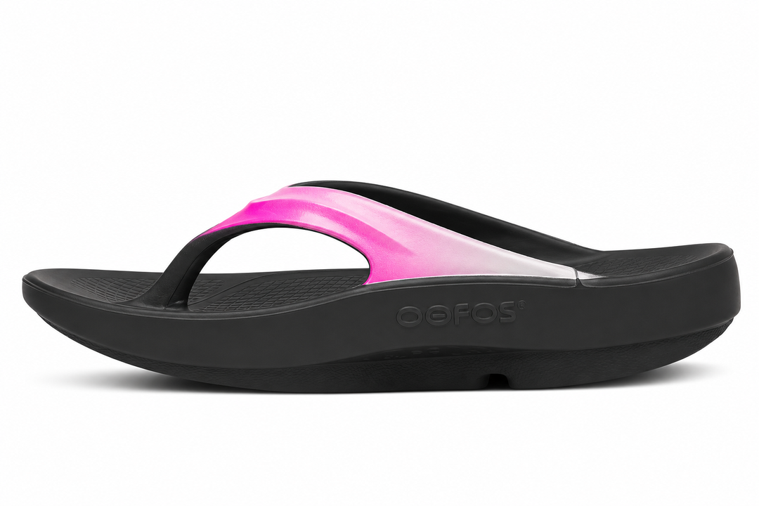 A single black Oofos OOLALA sandal with a vibrant pink and white gradient strap, shown from a side profile on a white background.
