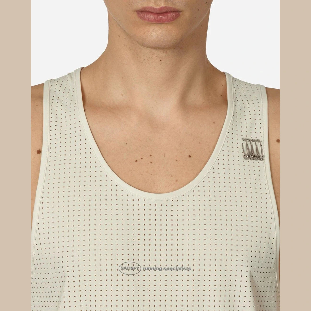 Close-up of a model wearing a light beige perforated Space-O Singlet--Men&
