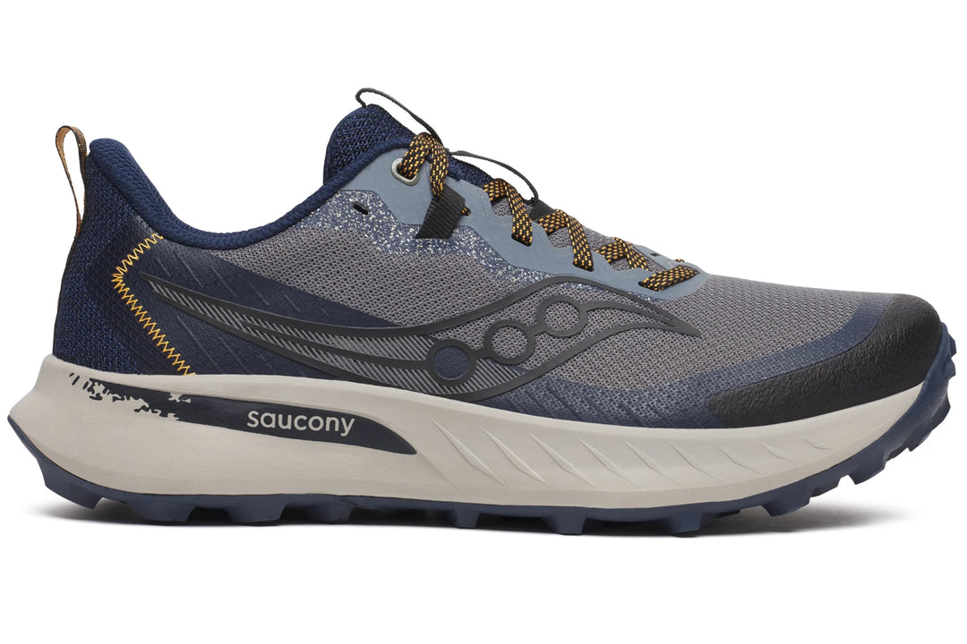 A Saucony Peregrine 15 – Men's trail running shoe in navy blue and gray mesh with a thick off-white midsole and gold laces, shown from a side profile on a white background.