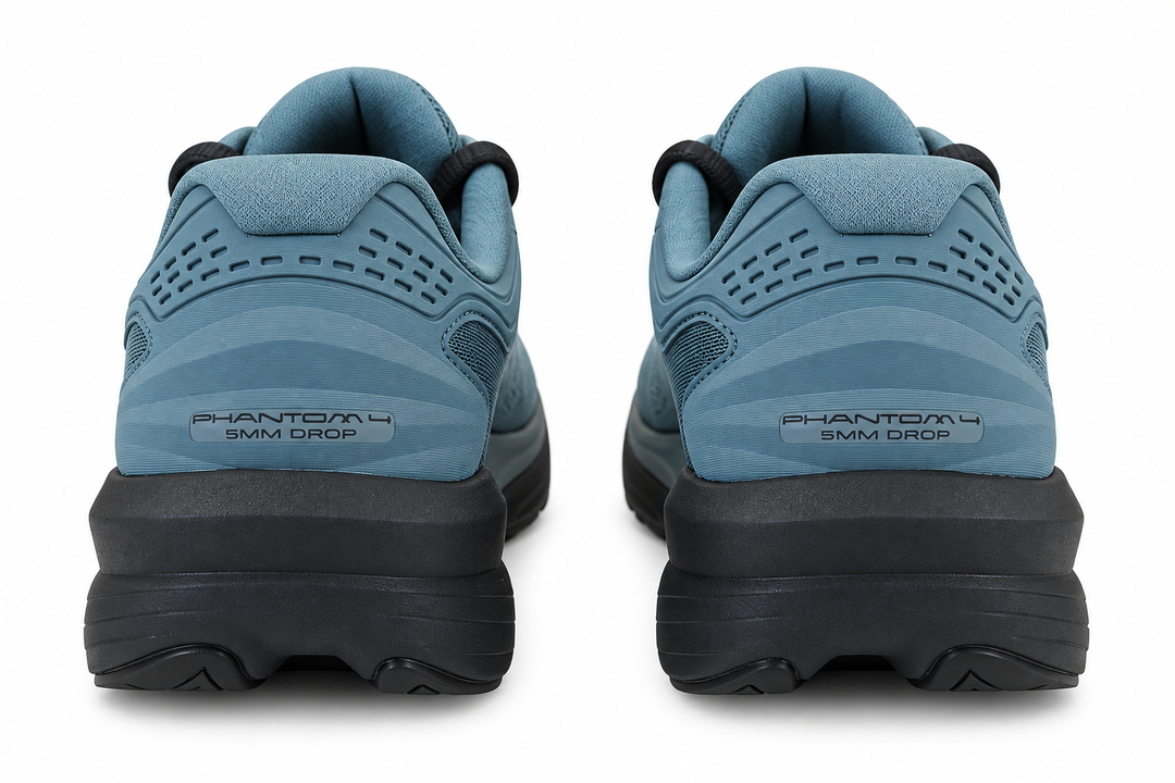 A pair of blue and black Topo Athletic Phantom 4 – Men&