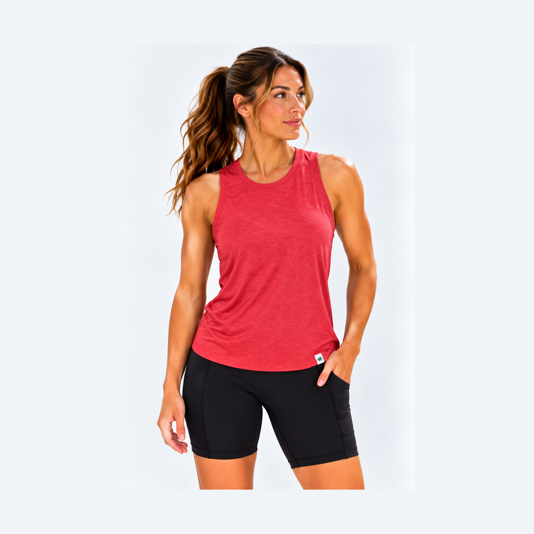 A woman wearing a Performance High Neck Tank Top – Women&
