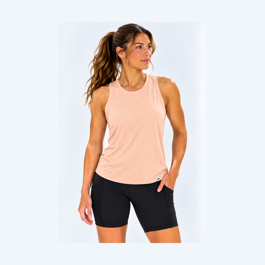 A woman wearing a Performance High Neck Tank Top – Women&
