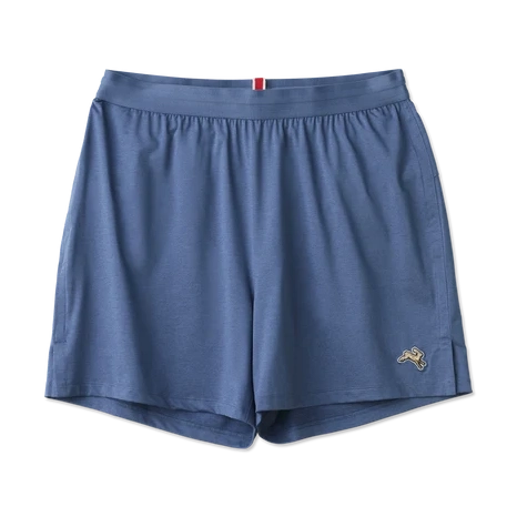 A pair of slate blue Session Shorts – Men's athletic shorts with a small embroidered logo on the lower left leg, displayed flat against a solid white background.
