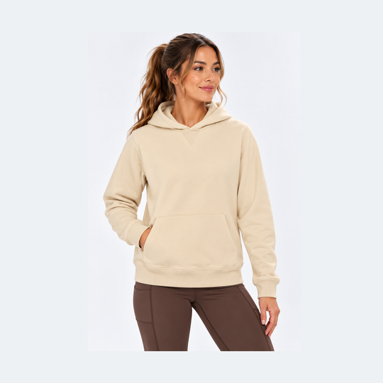 A woman wearing a light beige French Terry Hoodie – Women&